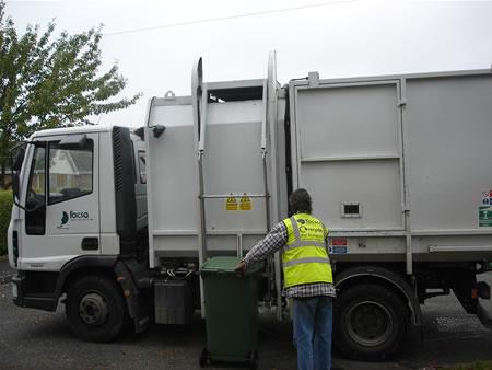 Our wheelie bin being collected…